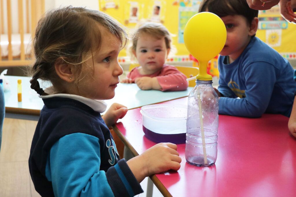 A children from Casvi International American School learning science